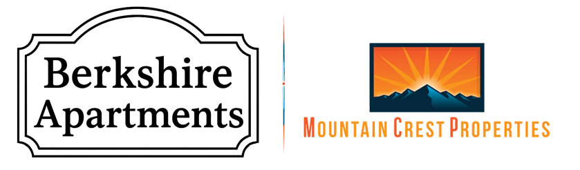 Two logos for apartment complexes, one green and one orange.
